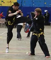 Dan doing front kick at Black Belt Grading